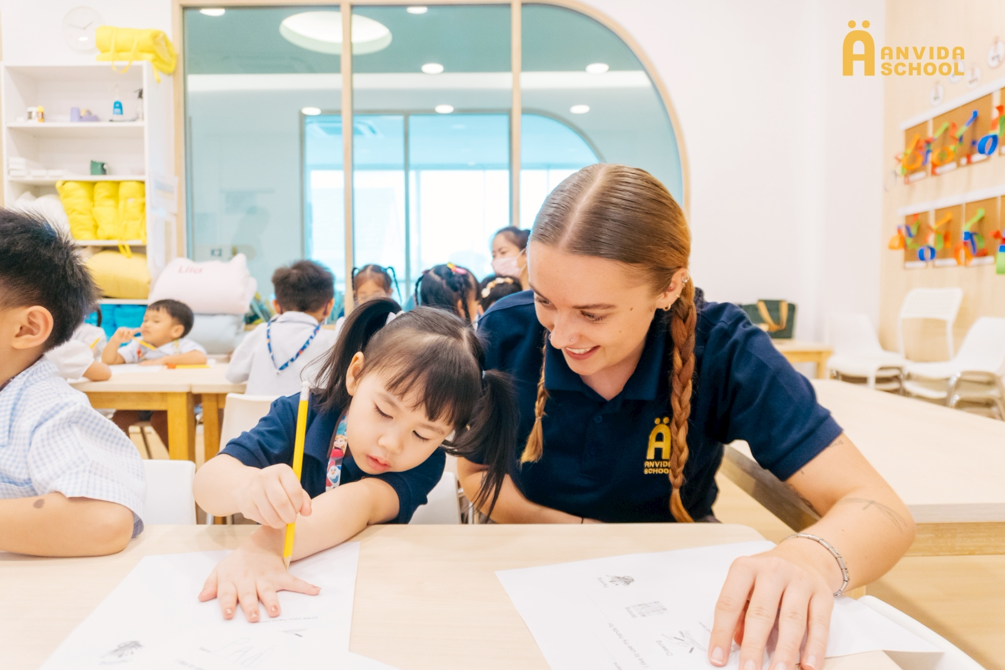 Teacher providing personalised attention to student